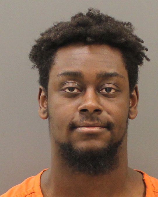 Facial picture of man with black hair and facial hair