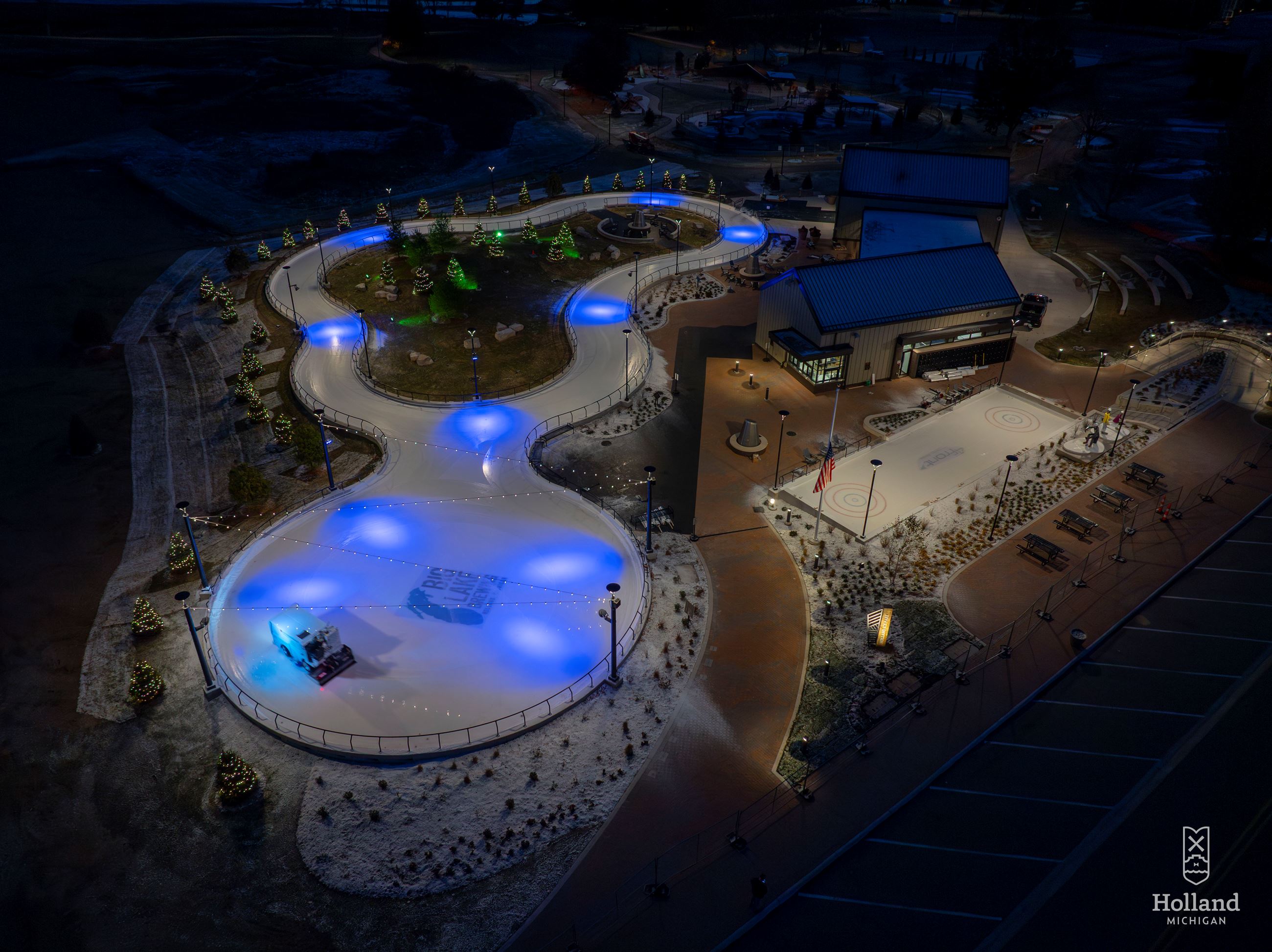 Nighttime drone photo of outdoor ice skating park